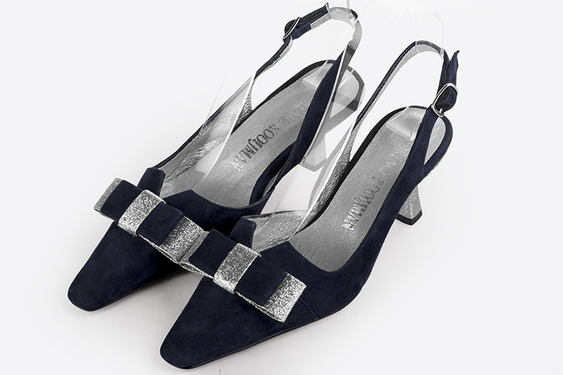 Navy blue women's open back shoes, with a knot. Tapered toe. Medium spool heels. Front view - Florence KOOIJMAN